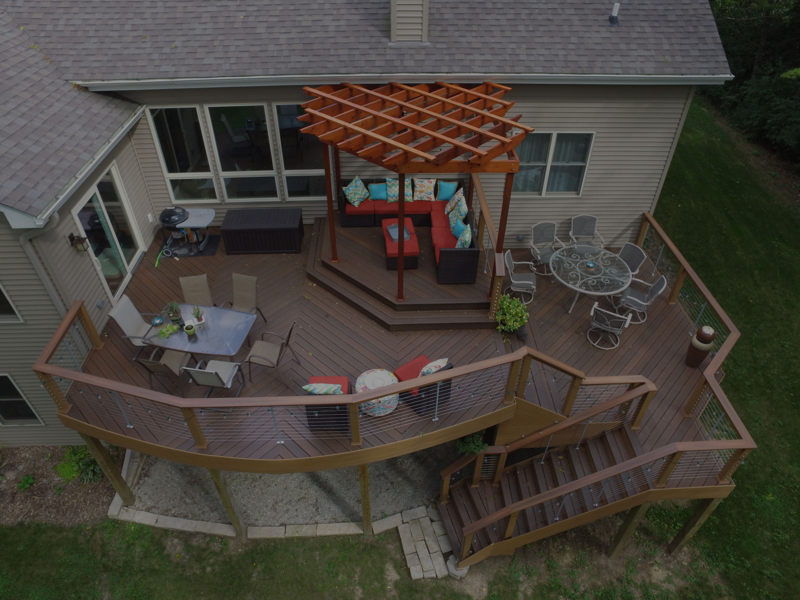 Aerial photo of a composite deck with a custom pergola