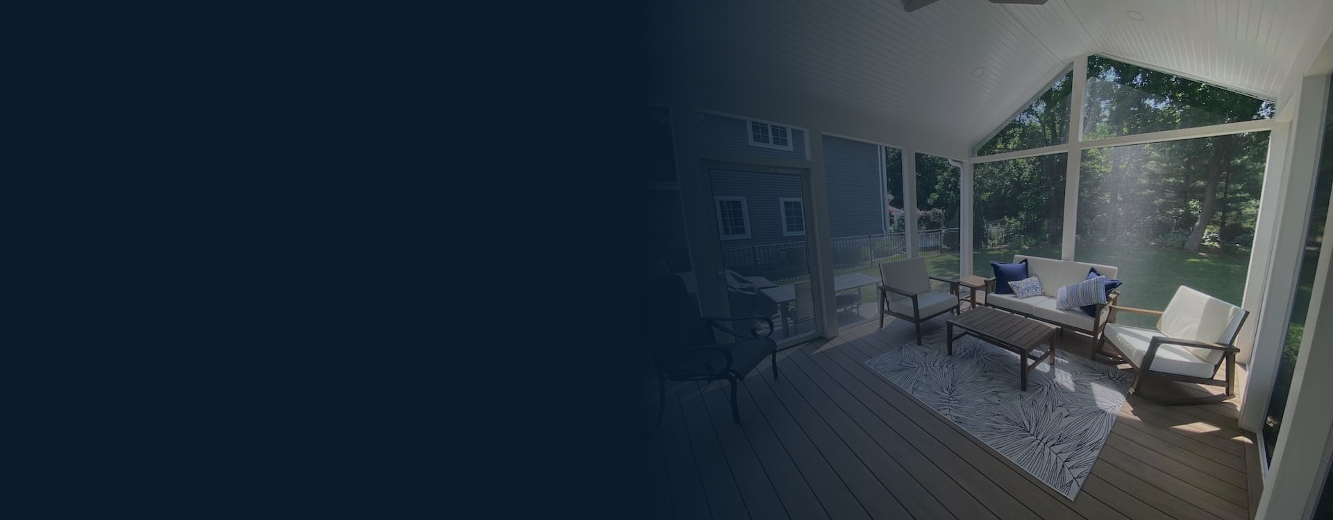 interior-of-the-screend-in-porch-with-couches-and-table-with-big-trees-on-the-background-in-wisconsin